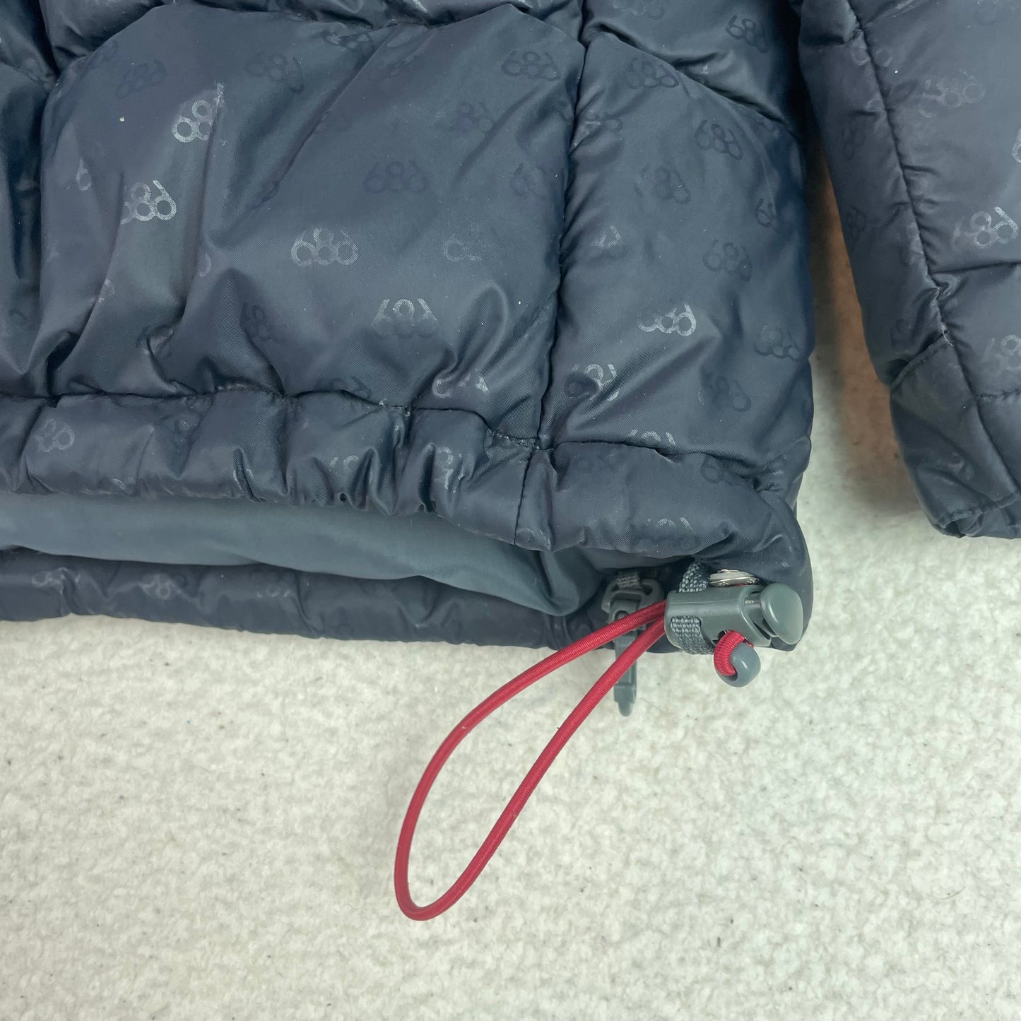686 Men's Black All-Over Logo Print Puffer Jacket