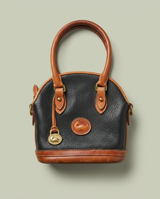 Vintage Dooney & Bourke Black Tan All-Weather Leather Dome Satchel Bag